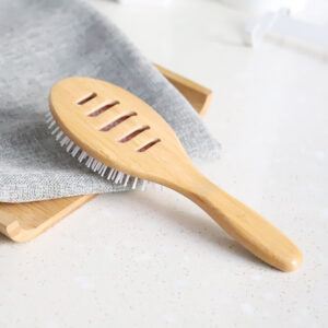 Hollow wooden paddle hair brush
