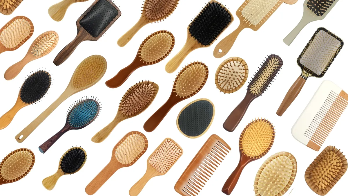 Assorted custom wooden hair brushes and combs in beech, bamboo and dark wood