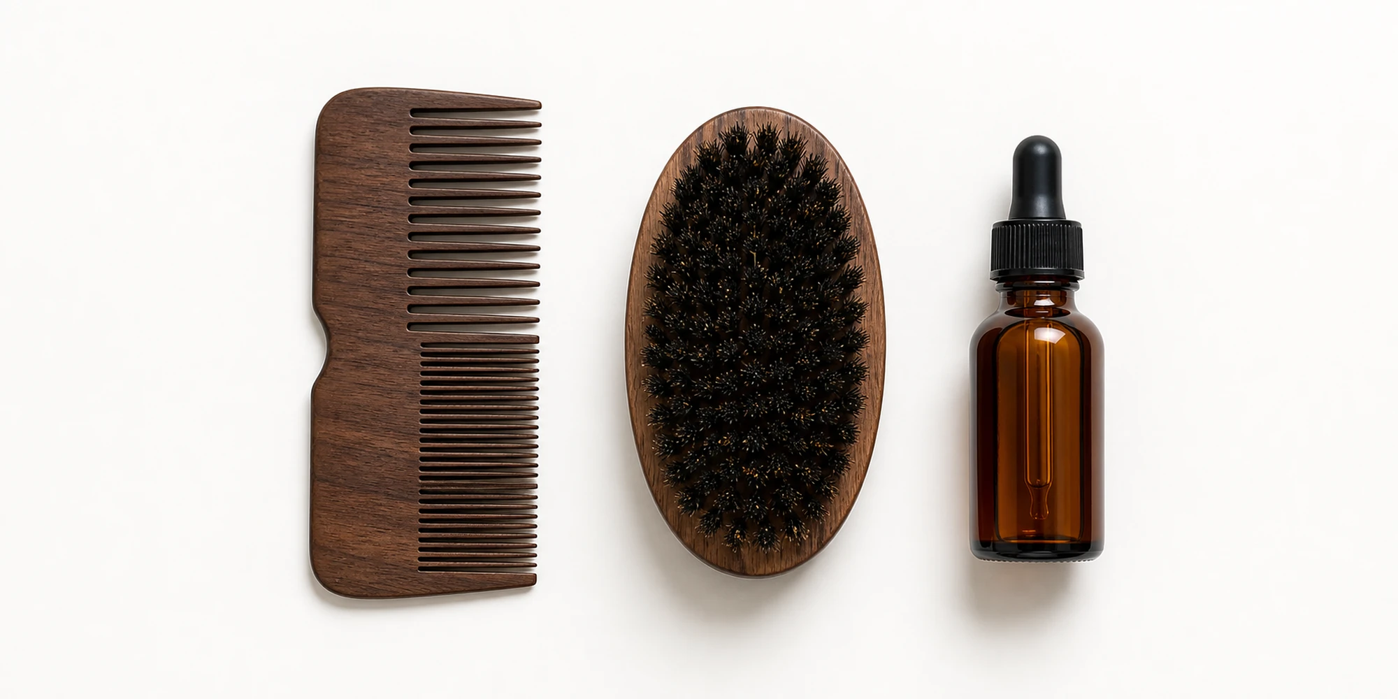 Beard brush comb and beard oil arranged together representing a complete beard grooming routine kit