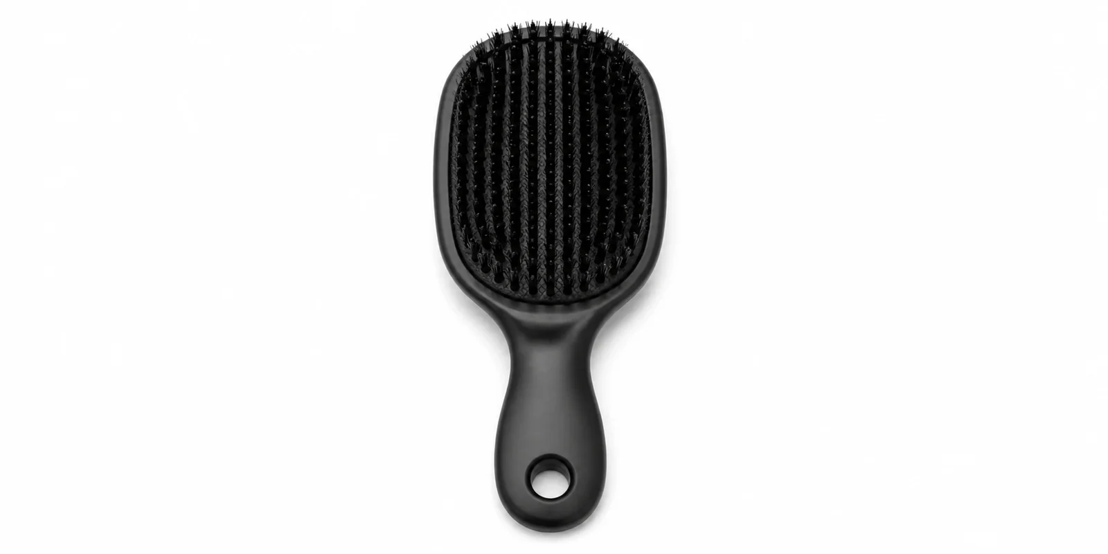 Small dense-bristle slick back hair brush shown for edge control and flyaway smoothing guide