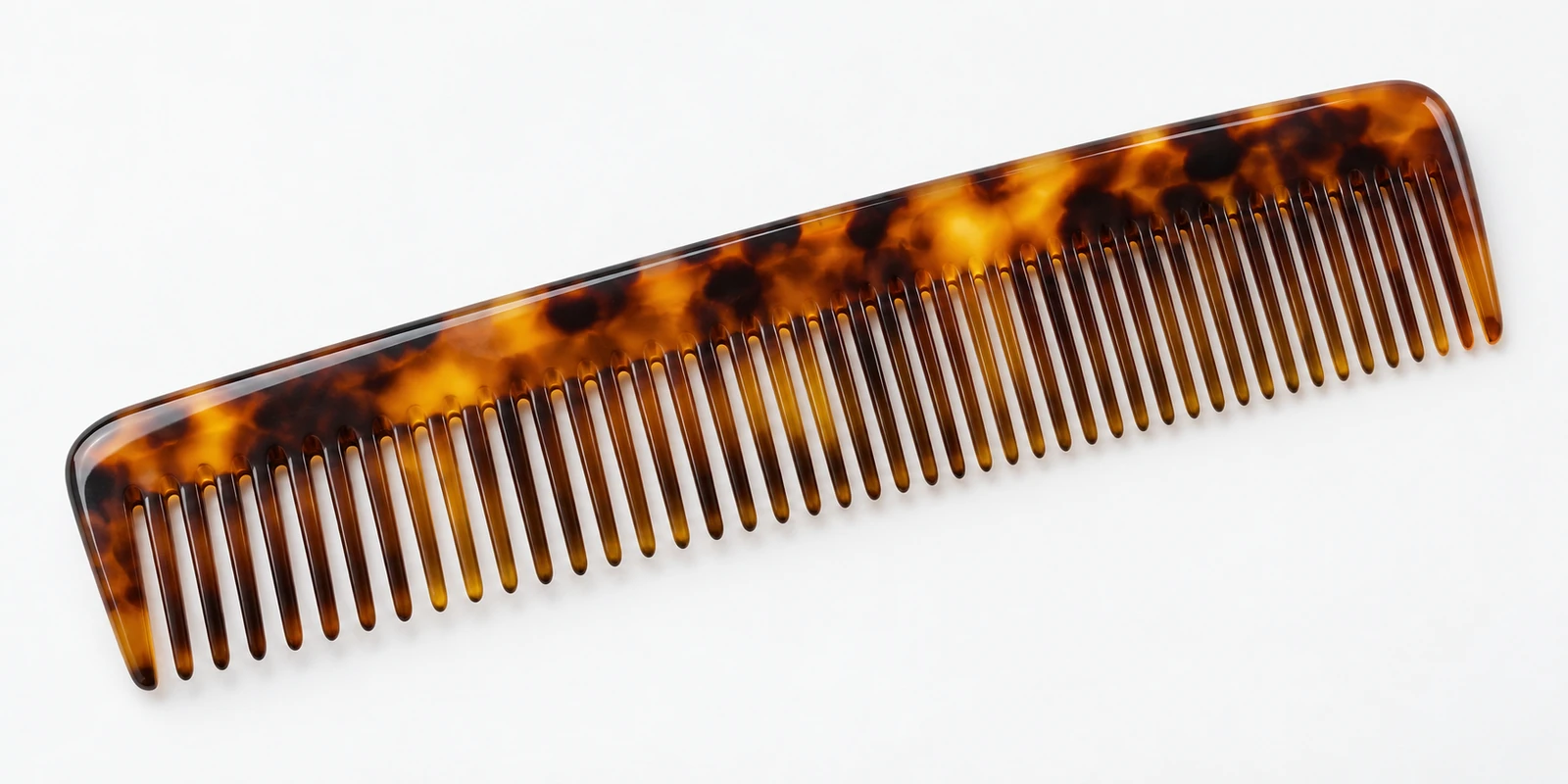 Handmade sawcut acetate comb shown for evaluating premium comb alternatives and value